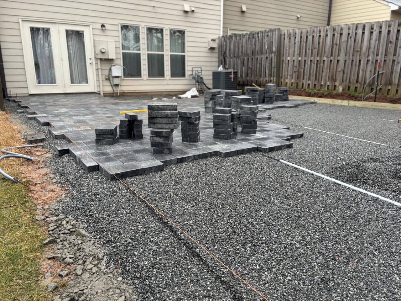 Laying premium pavers in pattern